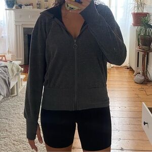 Light zip up with thumb holes